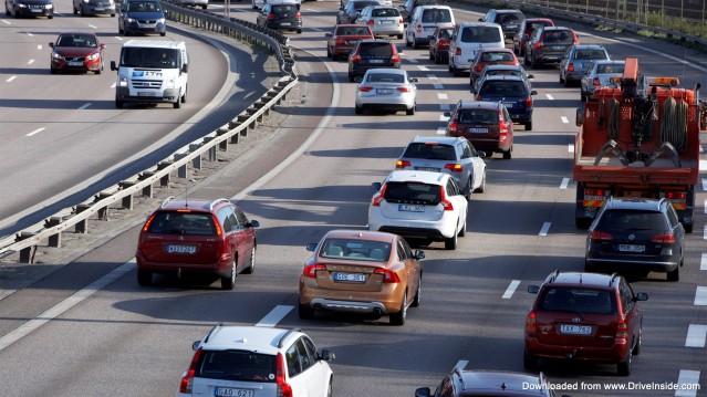 100 Volvo cars driving